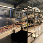 Tray-Strap_handling_system_01